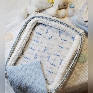 Hand crocheted doll bed with accessories